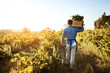 © Lyndon/peopleimages.com - Agriculture, farm and back of man with celery, natural produce and organic food in countryside field. Sustainability, agribusiness and farmer with box for eco farming, gardening and harvesting