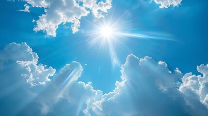 Wall Mural - clouds in the sky with the sun and sunlight sending out beams of light