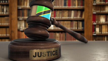 Wall Mural - Tanzania Flag on Judge Hammer in Court with Word Justice. Justice System 3D Illustration