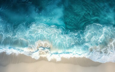 Wall Mural - Aerial view of ocean waves hitting the beach