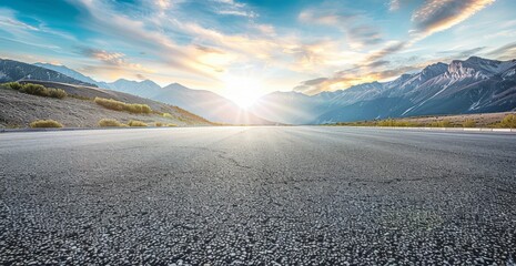 Wall Mural - Empty asphalt road and beautiful mountain landscape with sun flare background 