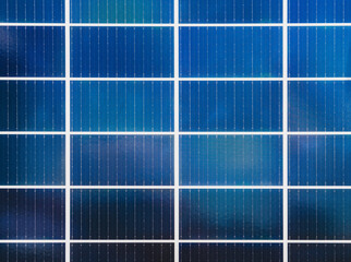 closeup photography of real solar panel in solar farm. photovoltaic surface high quality background.