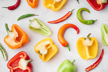 Wall Mural - Different fresh peppers on white background