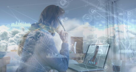 Poster - Image of network of connections with icons over clouds and woman using laptop