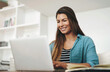 © Lyndon Stratford/peopleimages.com - Woman, laptop and smile in home office at desk for work or freelance agency browsing on the internet. Exam, study and promotion test in journalism company with practice on website in apartment.