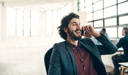 Businessman, phone call and laughing for discussion in office with b2b negotiation or client networking with mockup. Employee, consultation chat and professional advice or funny advisory in workplace