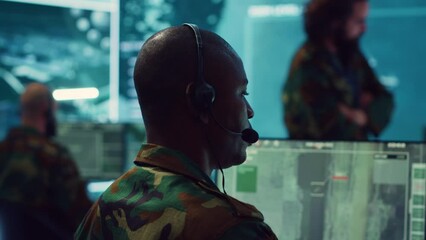 Poster - Telecommunications operator transmitting live information from satellite CCTV footage, supporting field troops with essential data. Federal agency working on reconnaissance system. Camera A.