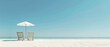 © STOCKYE STUDIO - white sand beach in a sunny day, umbrella with wooden chairs