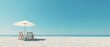 © STOCKYE STUDIO - white sand beach in a sunny day, umbrella with wooden chairs