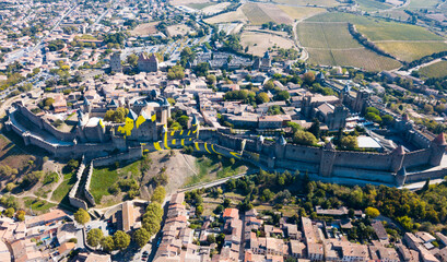 Wall Mural - Aerial view of French fortified city of Carcassonne with medieval citadel in sunny autumn day