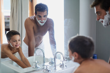 Canvas Print - Bathroom, self care and father shaving with kid for hygiene, grooming and health routine. Bonding, child development and boy learning razor facial epilation treatment with dad for wellness at home.