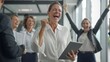 © Studio Nova - The joyful businesswoman holding tablet