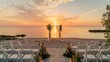 © Leli - A wedding ceremony setup on a beach with sunset in the background