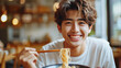 © ZzGooggiigz - Retro style. A young attractive guy eats Chinese noodles.Generative AI