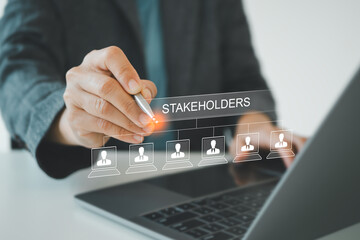 stakeholders concept. person touching stakeholders icon on virtual screen for business finance stake