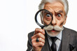 © Igor - funny man detective looking through a magnifying glass Isolated on white background