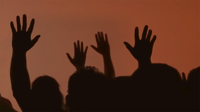 Silhouette Hands Raising Worshipper.
