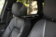 © New Africa - Clean leather seats inside of modern black car