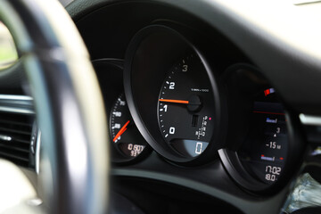 Wall Mural - Speedometer and tachometer inside of modern car, closeup