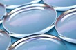 © komthong wongsangiam - Eyeglasses lens production industry, close-up eyeglasses lenses, Glasses lenses, eyeglasses lenses, eyeglasses store business concept