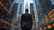 © photo for everything - a businessman standing with his back to the camera, gazing out over a sprawling city skyline