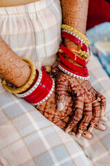 henna tattoo on women's hands