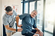 © ReadyAtTheEase/peopleimages.com - Physio therapist, chiropractor and senior man with back pain for rehabilitation, consulting and exercise. Healthcare, physical therapy and person and patient for medical service, wellness and support