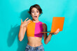 © deagreez - Photo of sweet shocked woman wear pink orange top getting message modern gadget isolated teal color background