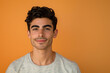 © MagnusCort - A close up portrait of a young man with a subtle smile