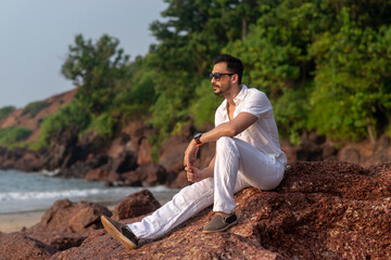 Wall Mural - man at the beach in white clothes