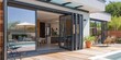 © Александр Михайлюк - Access to the terrace through an aluminium folding door