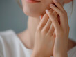 © mirifadapt - beautiful young female hands gently touching her skin, close-up, concept of tender young healthy skin and care