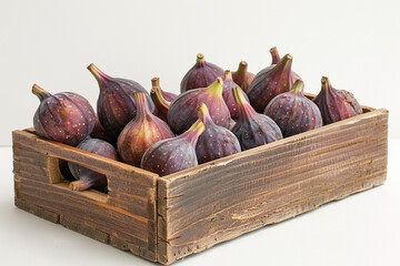 Wall Mural - Figs in a wooden box on a white background. Farm bioproducts.