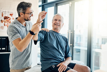 Canvas Print - Physiotherapy, chiropractor and happy old man with arm pain for rehabilitation, consulting and exercise. Healthcare, physical therapy and person with patient for medical service, wellness and support