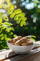 Wall Mural - tamarind in a bowl in a white bowl on a wooden table. Selective focus