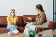 © Ilona - Psychological counseling scene.  A psychologist conducts a session with a patient in the office.