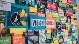 colorful vision board filled with pictures, keywords, and icons representing various professional goals, education and career