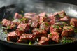 © Sandu - Sizzling Beef Cubes in Frying Pan
