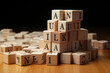 © arnaud - Des cubes en bois alphabétiques forment une barricade, chaque lettre enseignant des concepts aux enfants, transformant le jeu en apprentissage amusant.