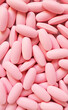 © jobi_pro - Heap of pink oval shaped pills for the concept of medical