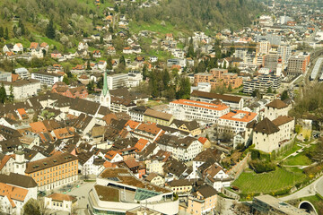 A city view with a lot of buildings and a church