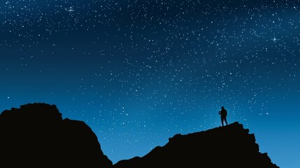 Wall Mural - Silhouette of man on mountain peak under starry sky