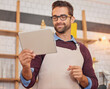 © Arnell K/peopleimages.com - Coffee shop, restaurant and man on tablet for online menu, checking stock and product inventory. Barista, cafeteria and small business owner on digital tech for internet, networking and website order