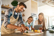 © Lyndon/peopleimages.com - Family, cooking and diet with people, tablet and online for recipe or ingredients on kitchen counter for dinner. Healthy, food and meal prep for nutrition, together or bonding in clean eating at home