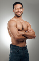 Wall Mural - man, portrait and confident in studio with abs or muscles, shirtless and grey background with model 