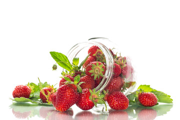 Wall Mural - fresh sweet red strawberries in a glass jar