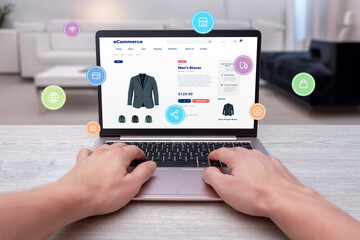 Poster - Hands typing on laptop, shopping online for men's blazer with levitating shopping icons. Modern concept of digital shopping convenience