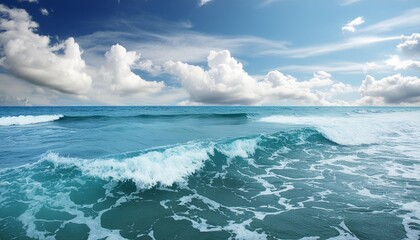 Wall Mural - soft ocean wave blue water and beautiful cloudy sky