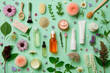 © PALASTIQUE - Presentation of cosmetics with natural flowers and natural ingredients, plants, organic elements, petals, on a green background, top view