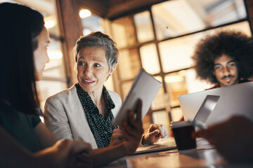 Fototapete - Night, tablet and boss in meeting with group, review and feedback for project, deadline and office. Teamwork, talking and people with tech, auditor and budget for business in corporate with research